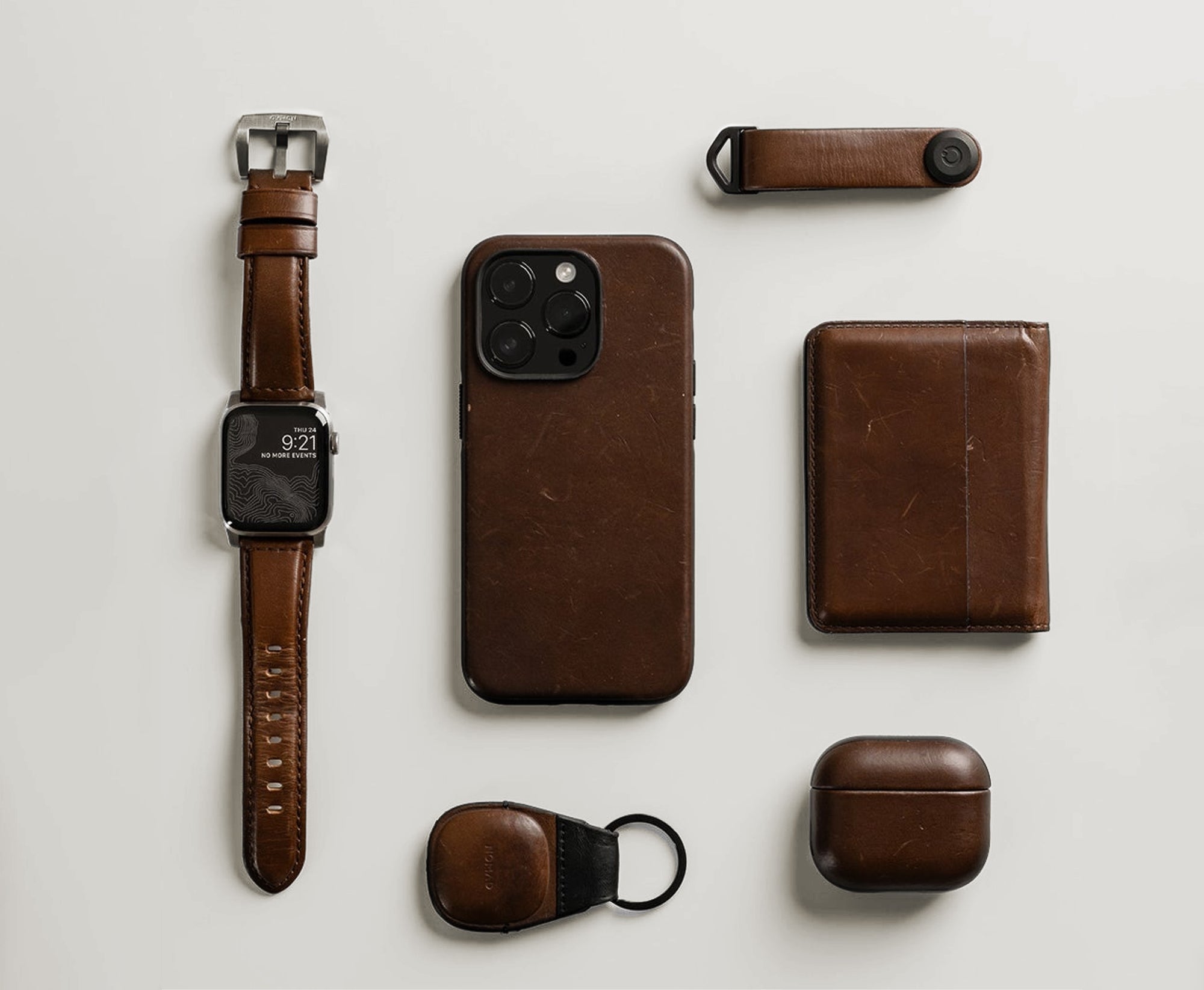 Horween leather accessories arranged on a light surface